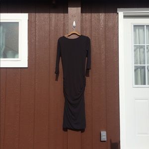 Dramatic long sleeved ruched maxi dress